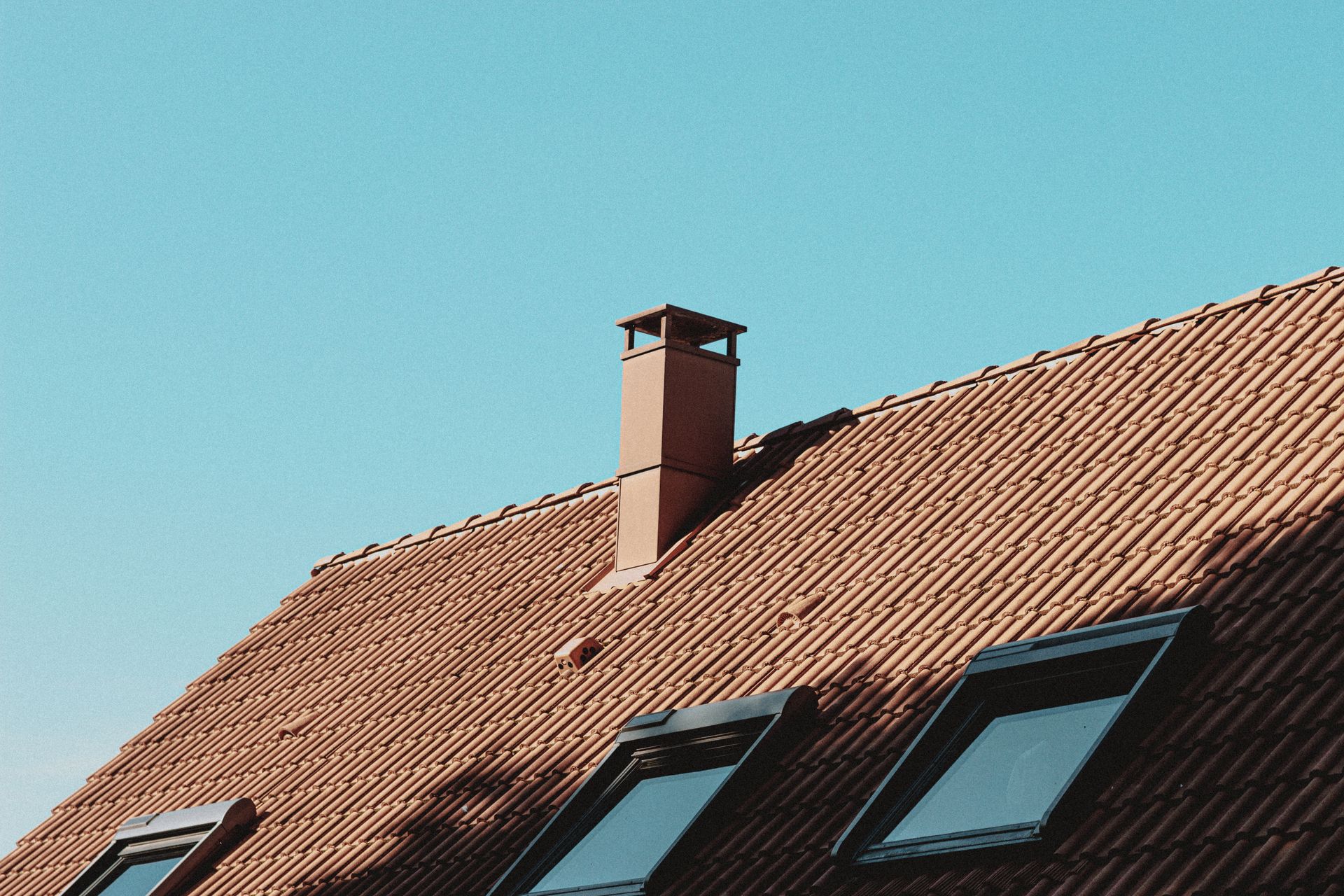 Residential tile roof with chimney